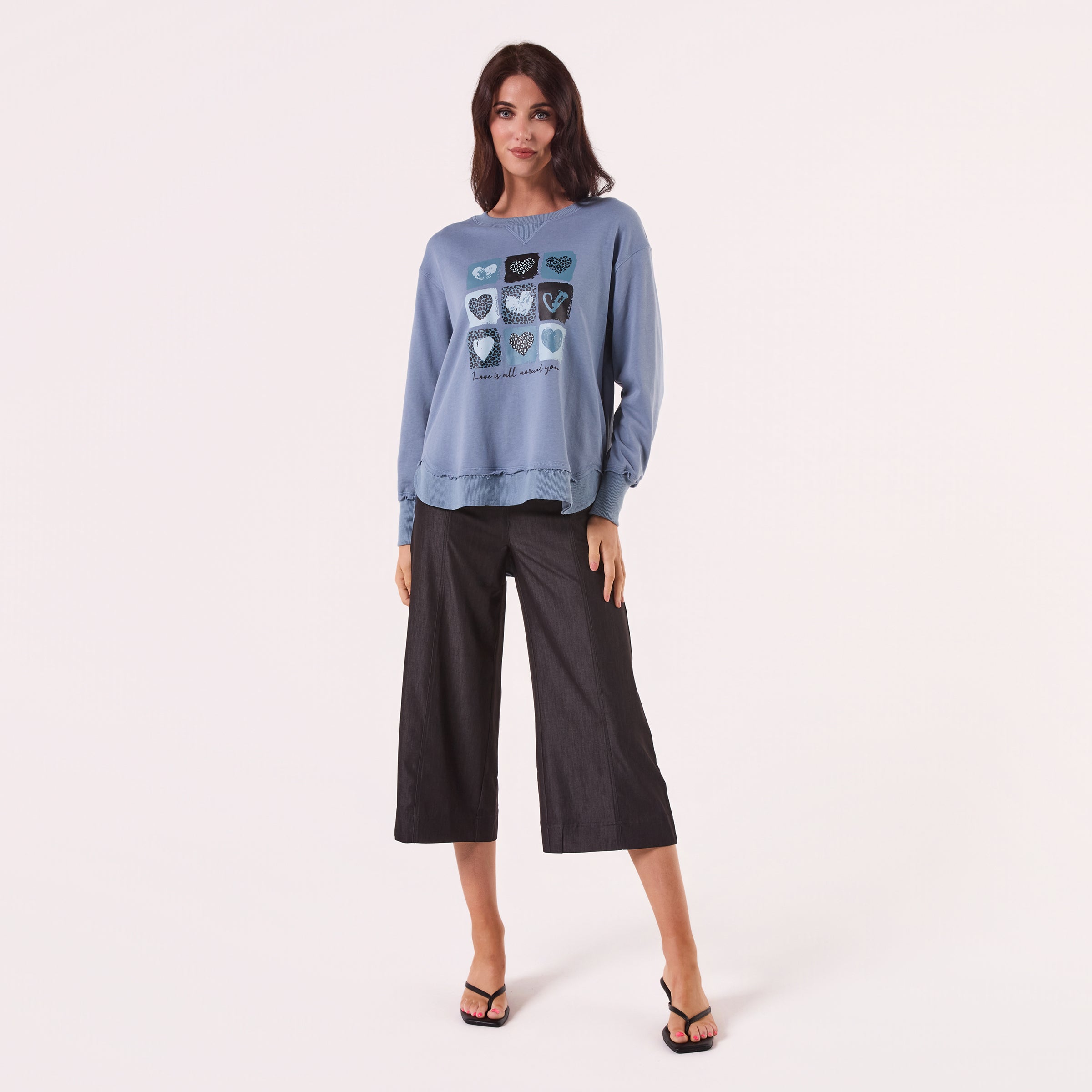 AM24026 MULTI PRINT SIDE POCKET SWEATSHIRT