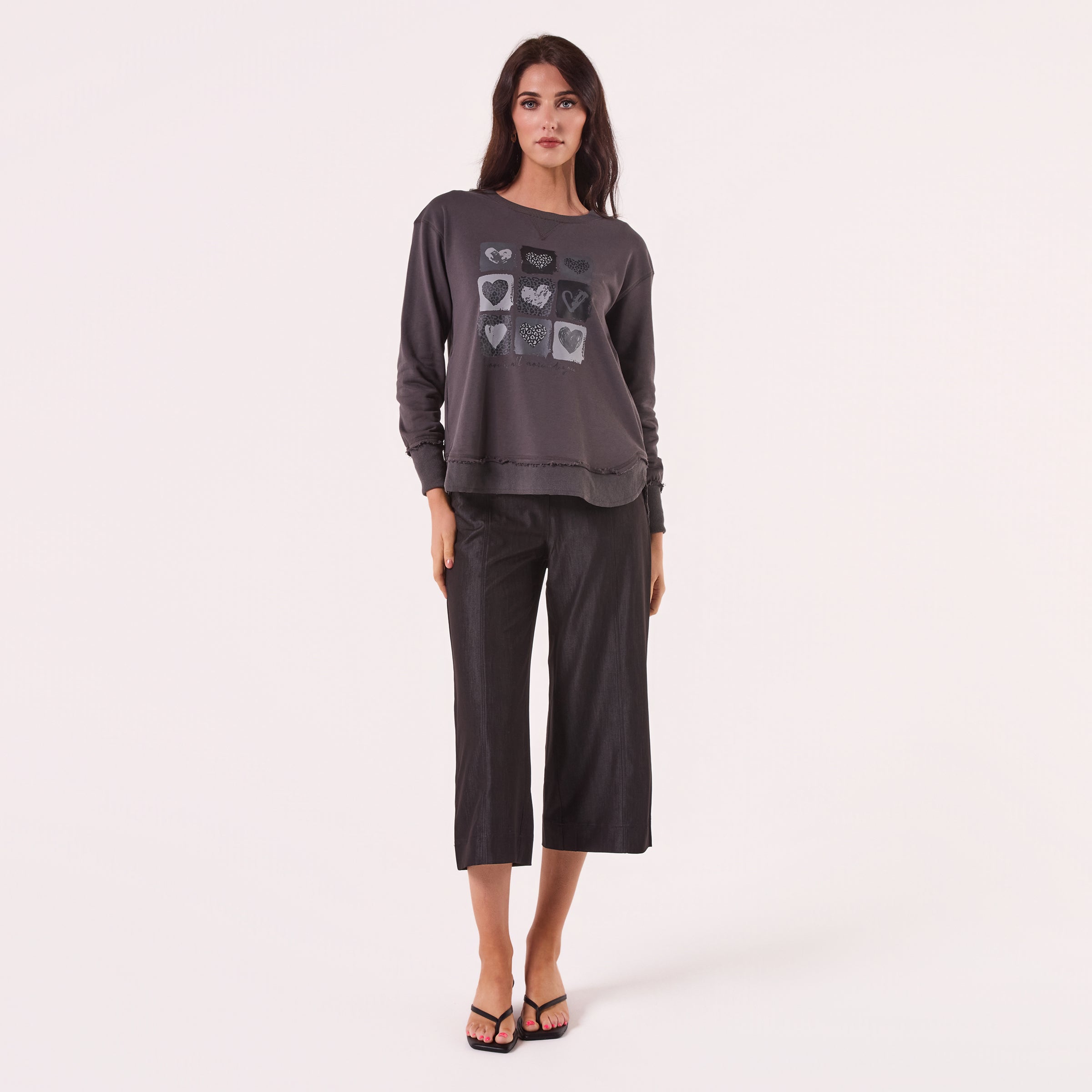 AM24026 MULTI PRINT SIDE POCKET SWEATSHIRT