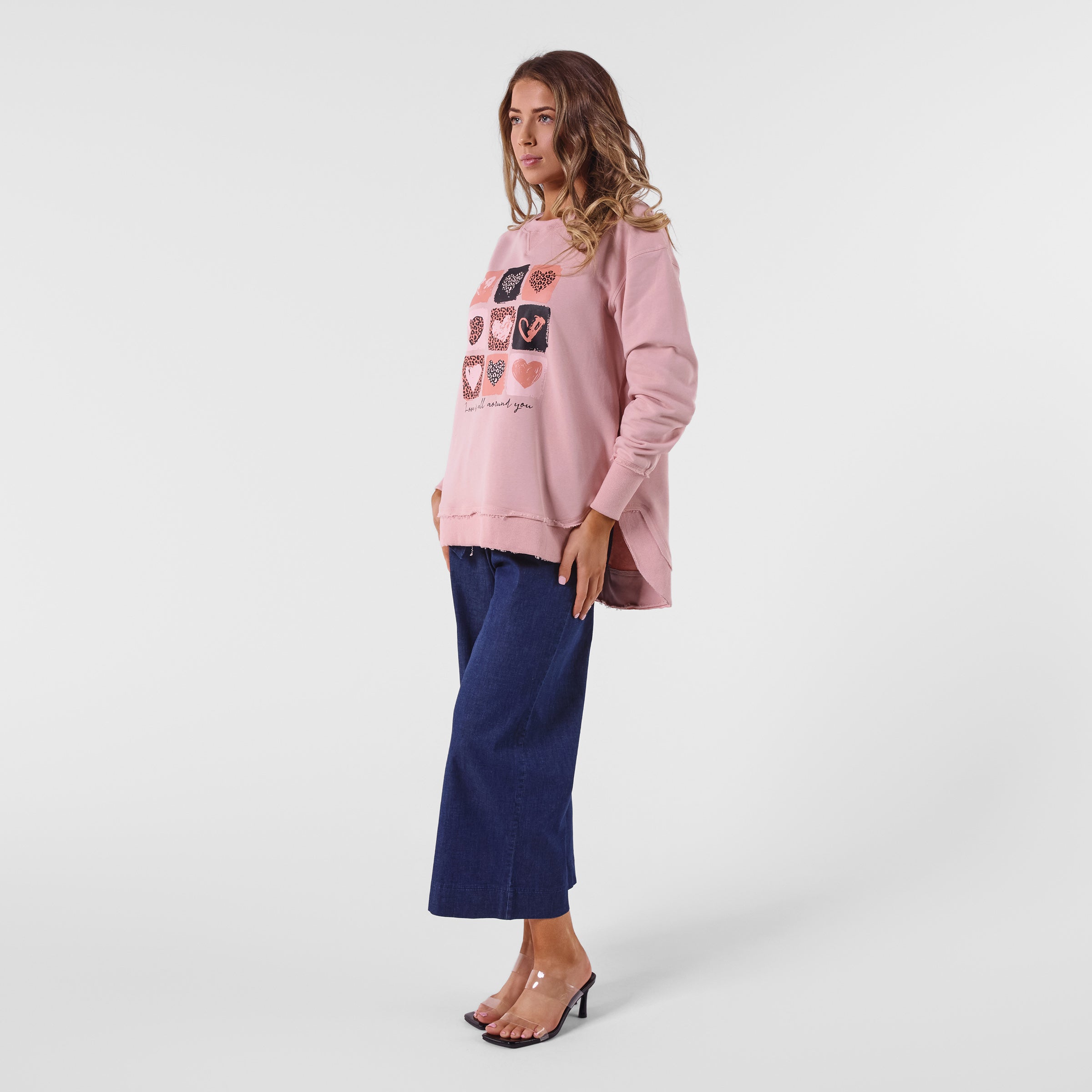 AM24026 MULTI PRINT SIDE POCKET SWEATSHIRT