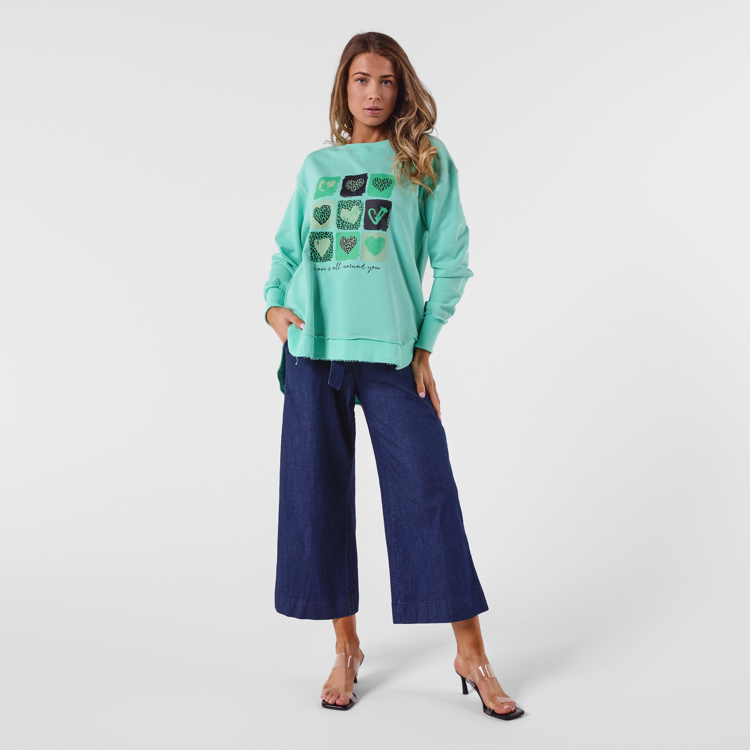 AM24026 MULTI PRINT SIDE POCKET SWEATSHIRT