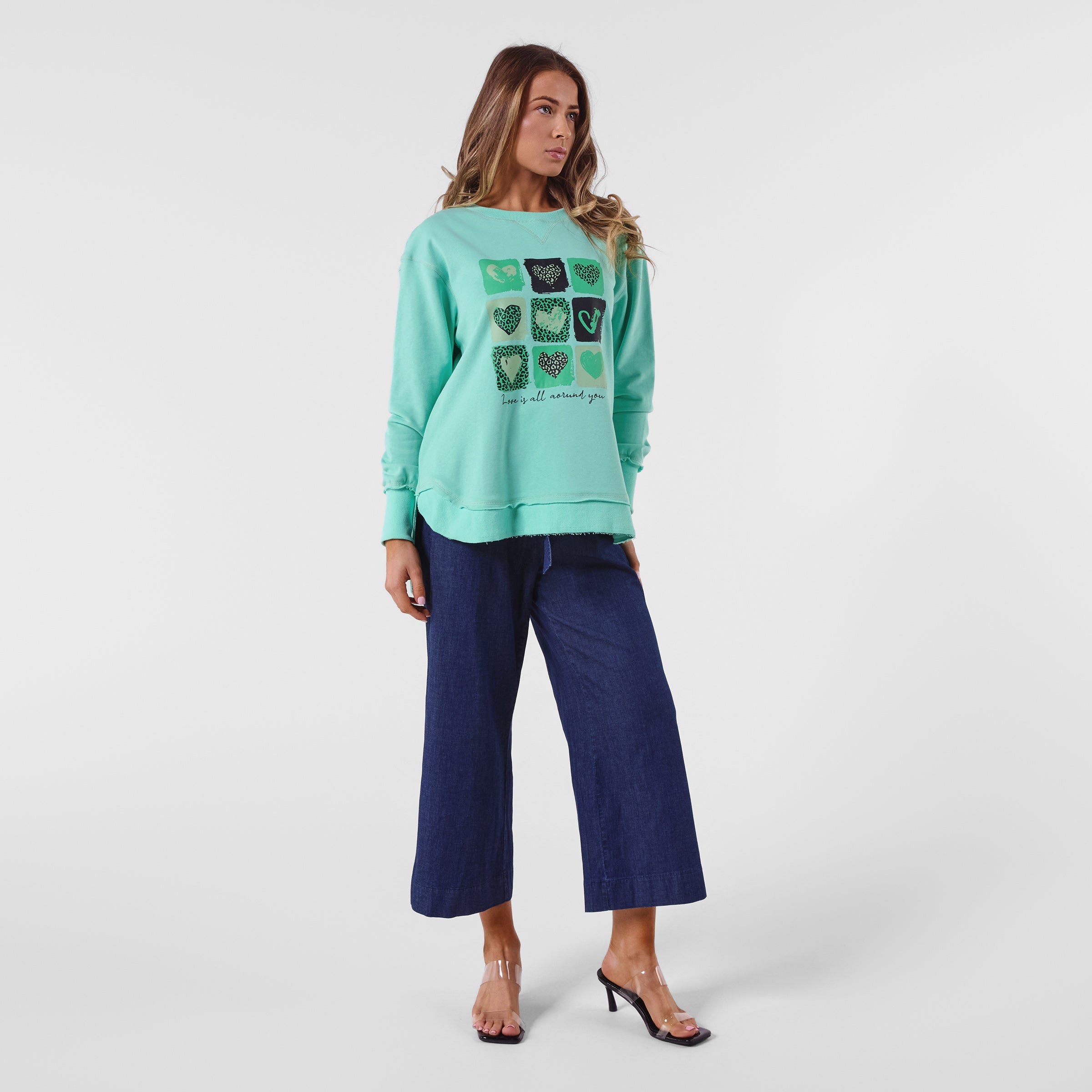 AM24026 MULTI PRINT SIDE POCKET SWEATSHIRT