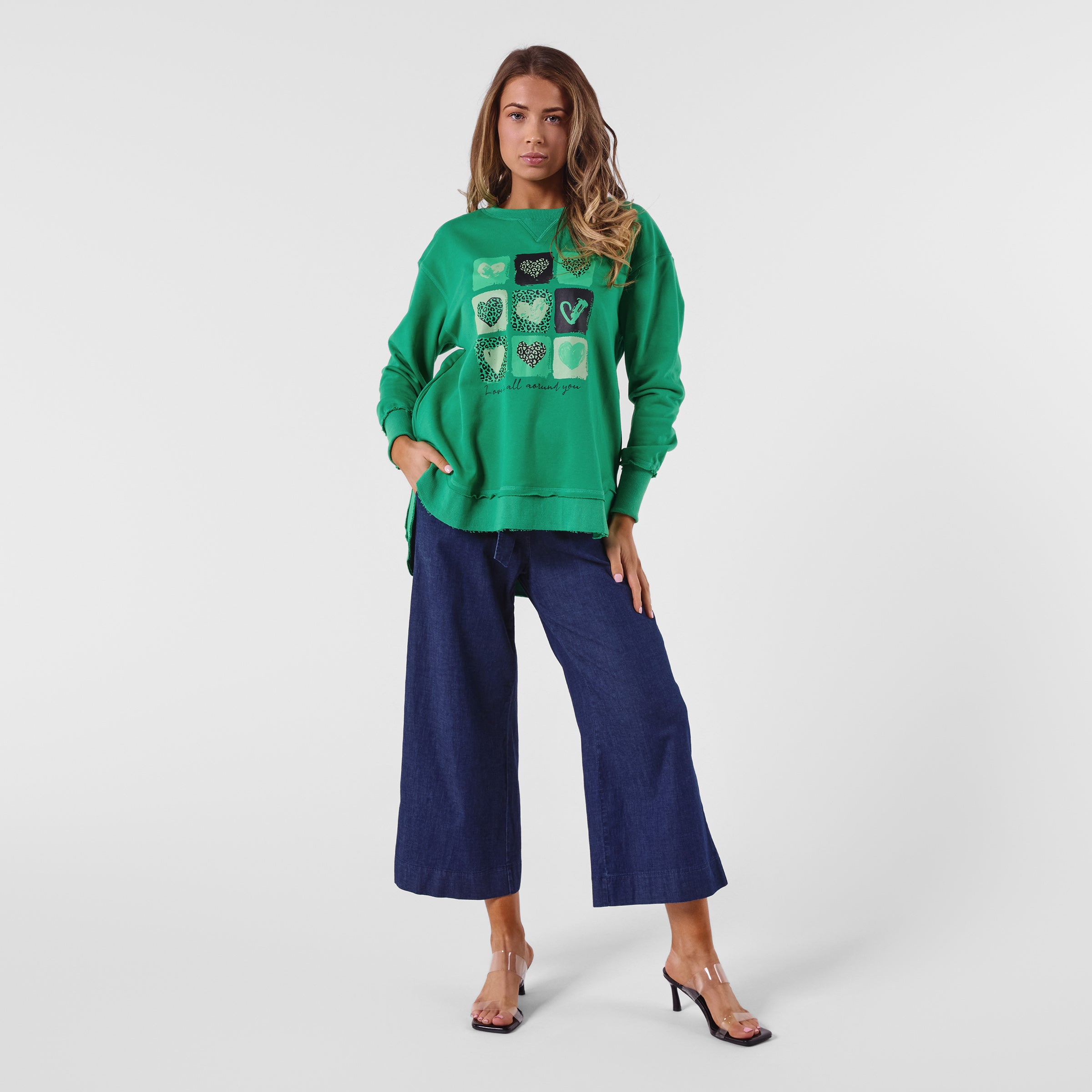 AM24026 MULTI PRINT SIDE POCKET SWEATSHIRT