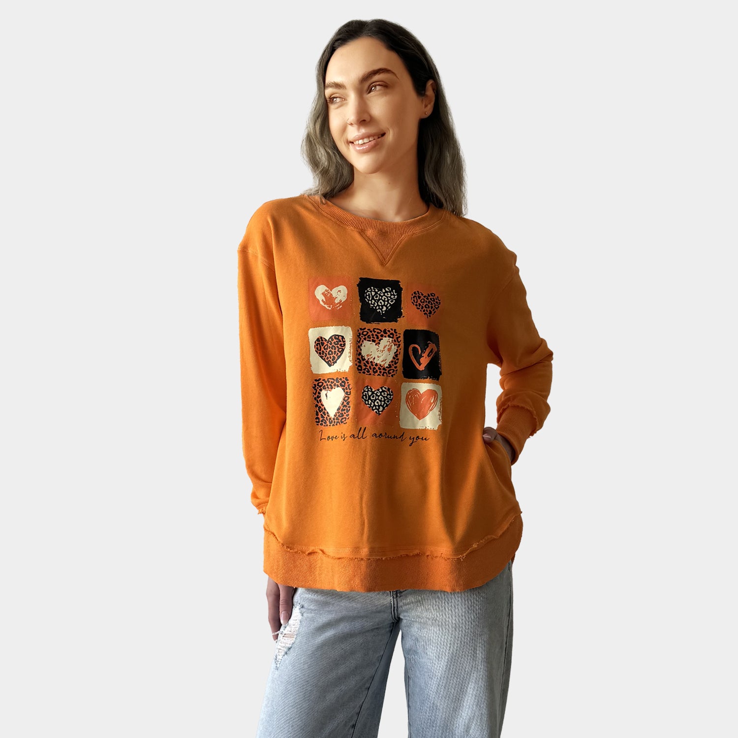 AM24026 MULTI PRINT SIDE POCKET SWEATSHIRT