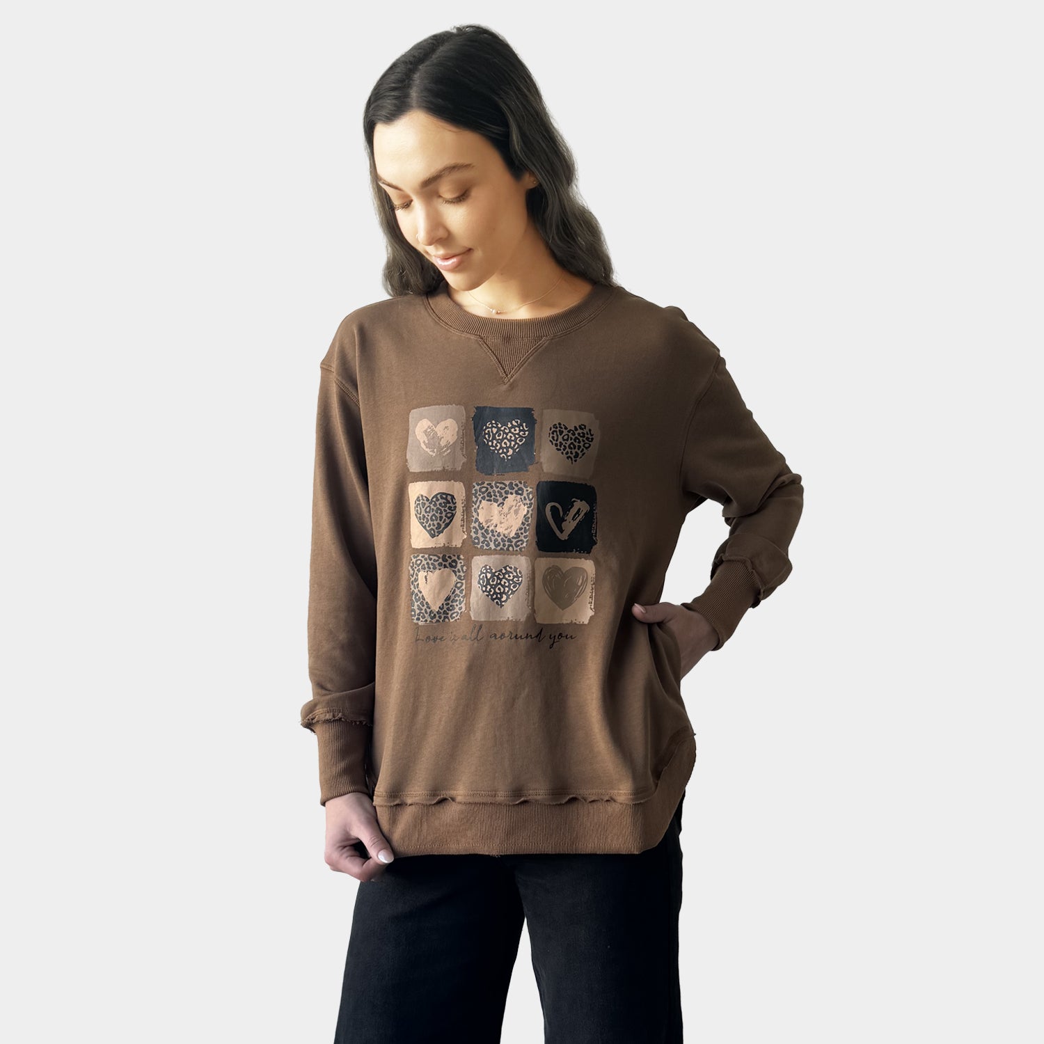 AM24026  MULTI PRINT SIDE POCKET SWEATSHIRT