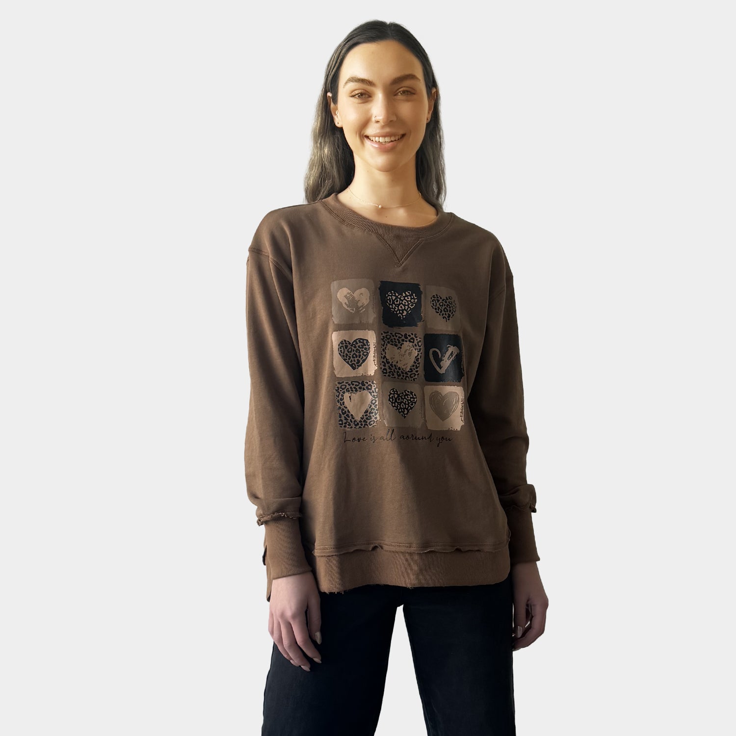 AM24026  MULTI PRINT SIDE POCKET SWEATSHIRT