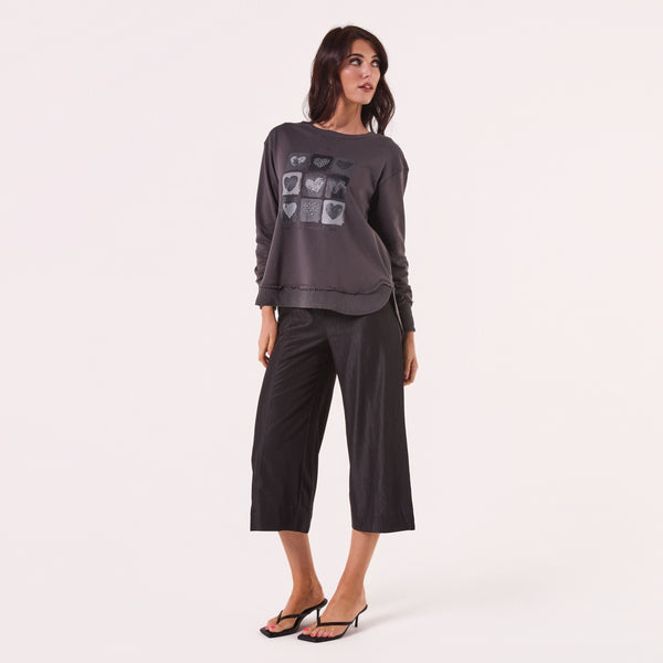 AM24026 MULTI PRINT SIDE POCKET SWEATSHIRT