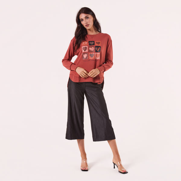 AM24026 MULTI PRINT SIDE POCKET SWEATSHIRT
