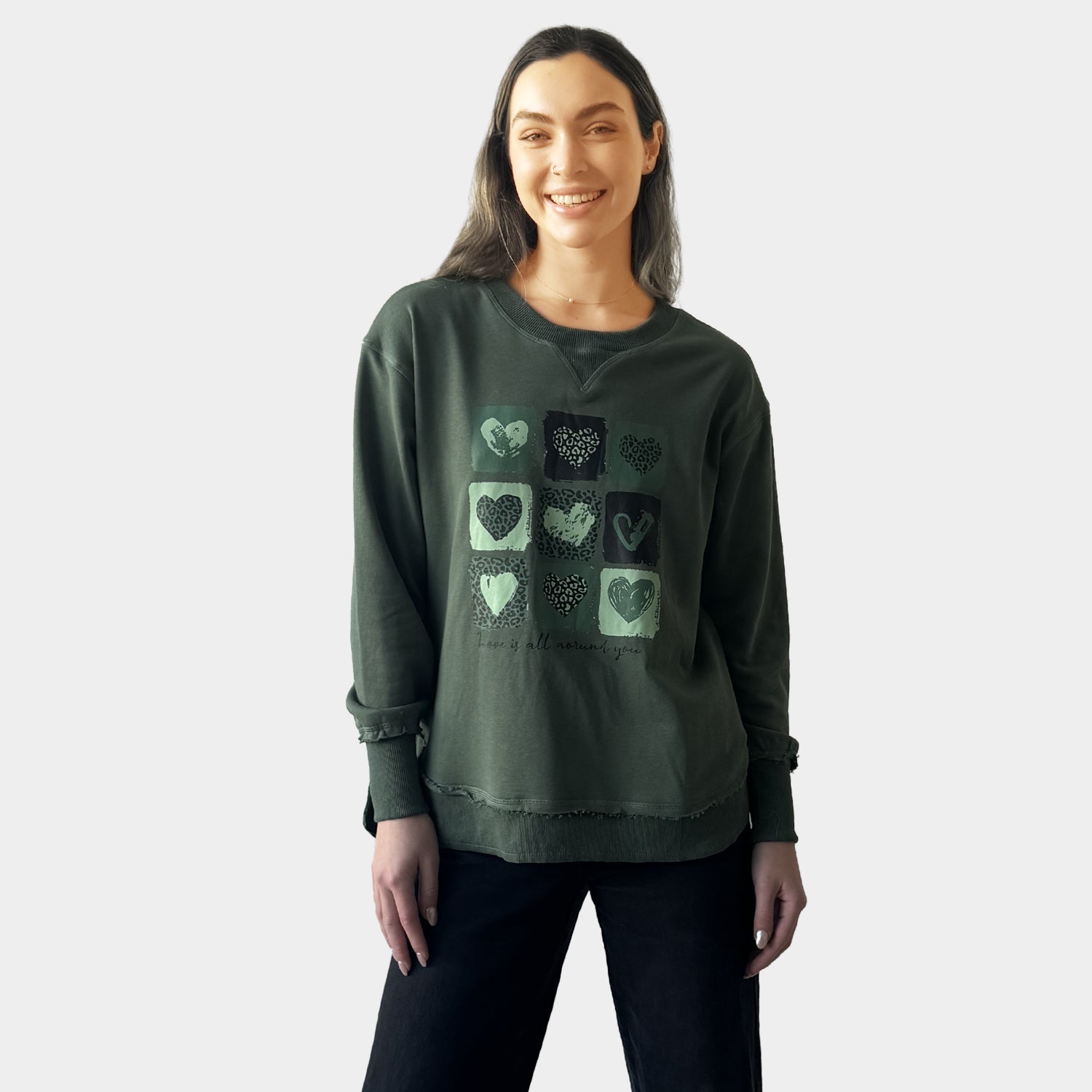 AM24026  MULTI PRINT SIDE POCKET SWEATSHIRT